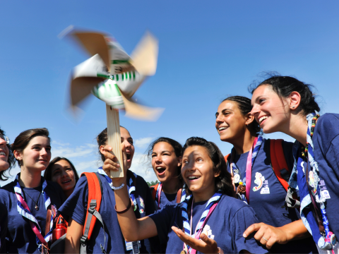 Scouts with paper windmill