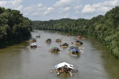 Rafts navigating in a river.