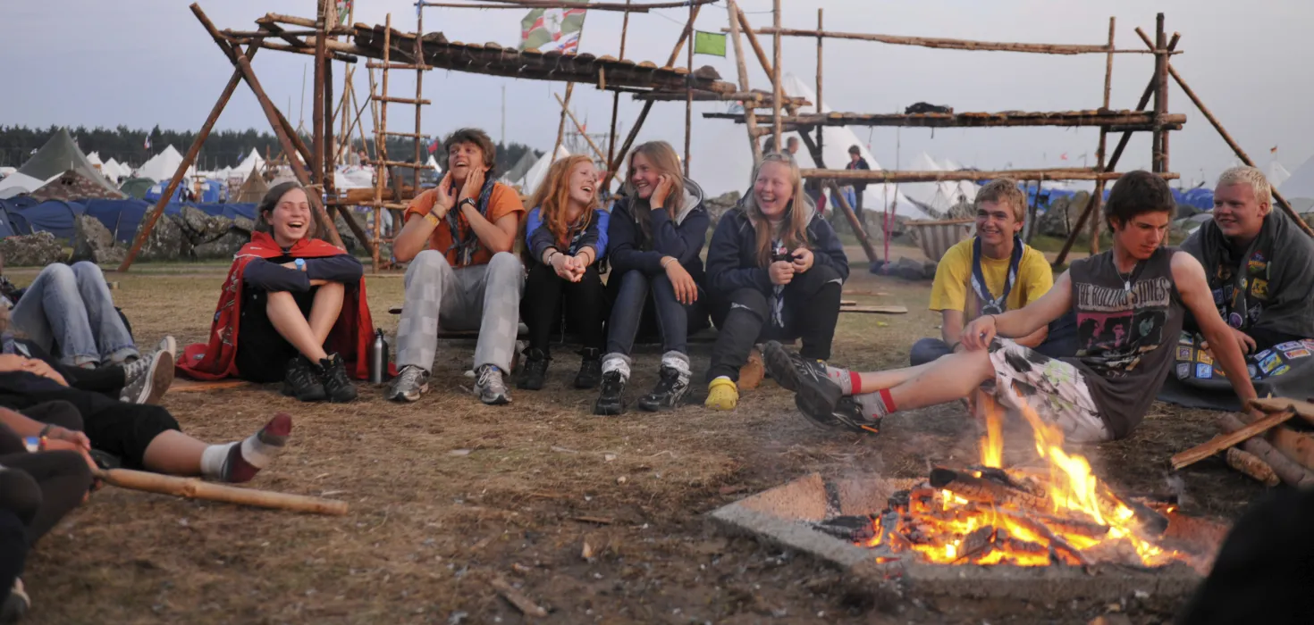 Scouts sitting around the campfire