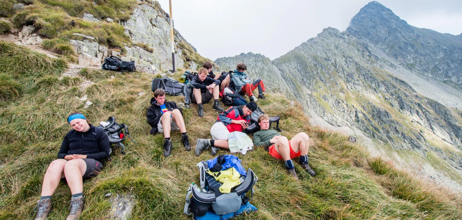 scouts chilling on top of a mountain