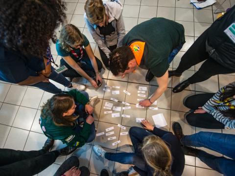 A circle of Scouts for a group task
