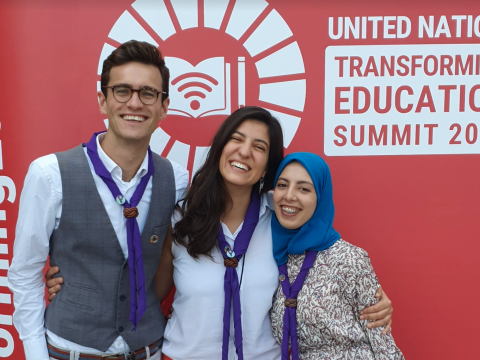 Three Scouts who are Youth Representatives to the World Organization of the Scout Movement pose together at the United Nations' Transforming Education Summit in New York City