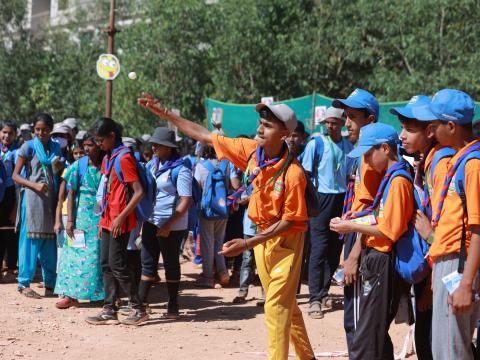 Scouts throwing a ball