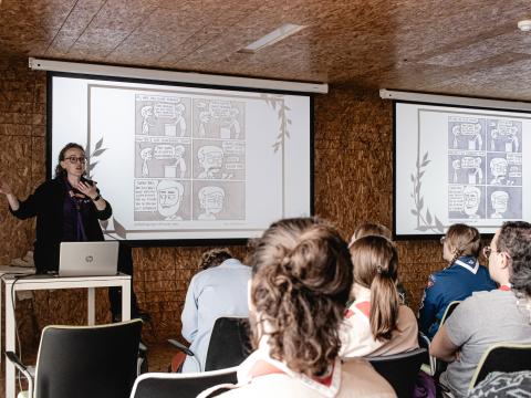 Maire presents in front of a group of Rovers during the Agora 2023.