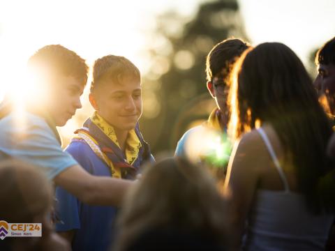 Young people interacting in the outdoors.