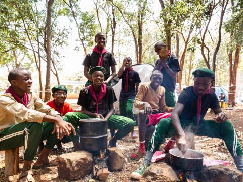 Scouts cooking at a campsite
