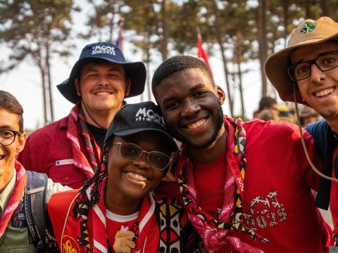 Scouts smile at the camera at the 16th World Scout Moot