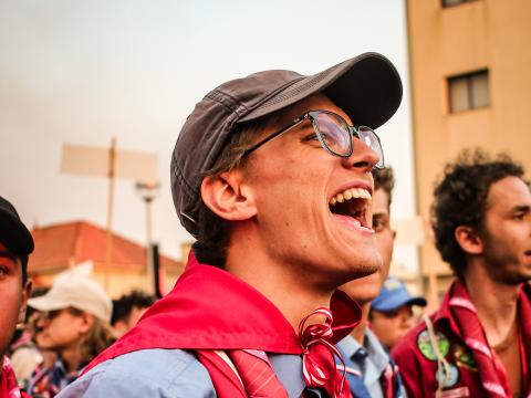 Rover from Peru singing at the opening ceremony of the 16th World Scout Moot at Cortegaça