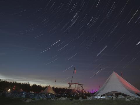 A view of stars over a campsite