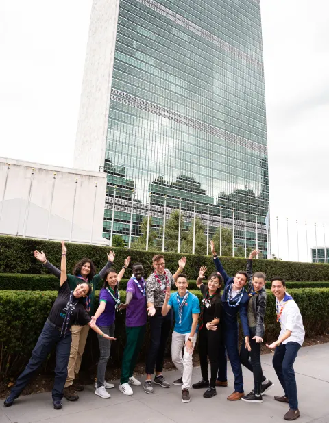 Scouts pose outside the UN headquarters in New York