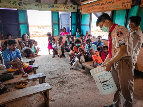 Raymund Romeo Guzman in a classroom