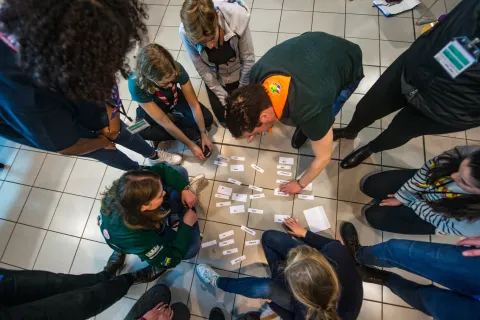 A circle of Scouts for a group task