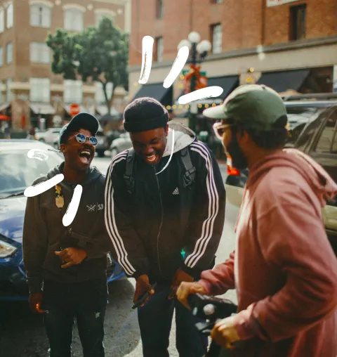 Three men laughing
