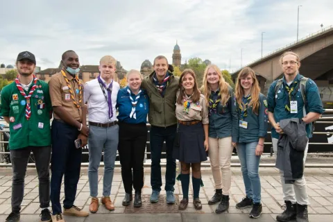 Scouts with Bear Grylls, Chief Ambassador of World Scouting, gather at COP26 to advocate for climate action now.