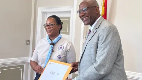 Patricia Salmon, Chief Commissioner of Antigua and Barbuda Scout Association (ABSA), and His Excellency Sir Rodney Williams, Governor General of Antigua and Barbuda and ABSA Chief Scout