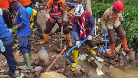 scouts clearing damaged water channel