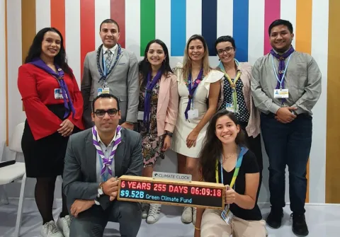 Scouts on stage after a successful events about Scouts for SDGs at the SDG Hub at COP27 in Egypt