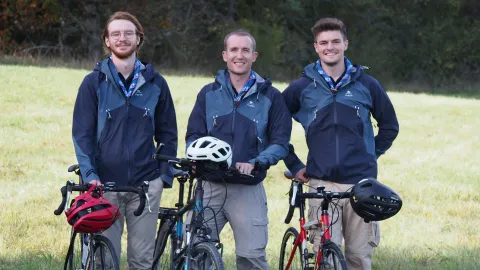Pierre, Antonin and Florian stand next to their bikes.