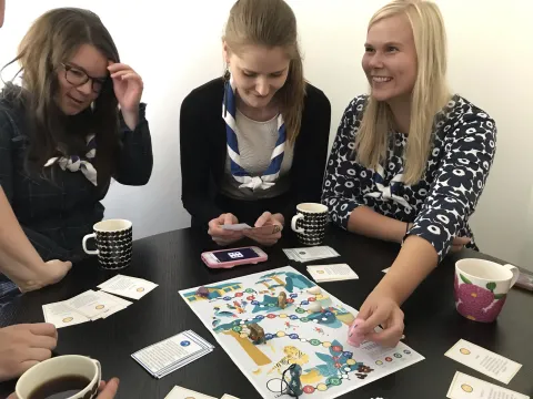 Scouts from Finland play with one of the games developed to raise awareness.