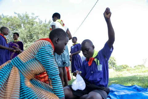 Scouts learn how to sew menstrual pads.