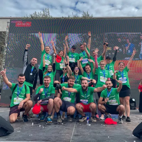 Scouts in Albania cheer ahead of their community marathon