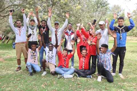 Scouts cheer during the Arab Parajambore