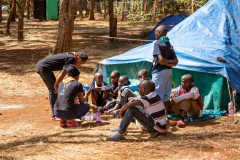 Scouts in Kenya practice first aid skills at camp