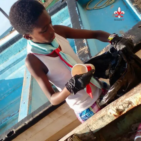 cub Scout helping
