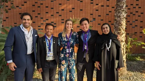 WOSM Youth Representatives Kek, Lucas and Laura join WOSM Secretary General Ahmad Alhendawi and World Scout Foundation Board Member HH Princess Sama Al Saud at the RewirEd Summit during COP28