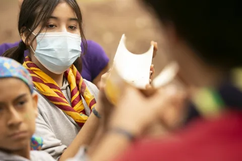 Scout wears face mask