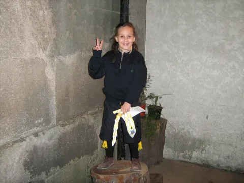Inês as a child wearing her Portuguese Scout uniform.