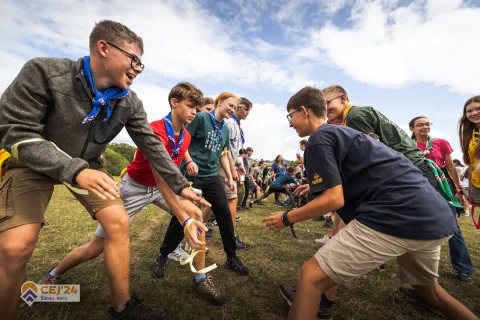 Scouts playing games with their scarves.