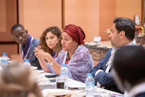 Amina Mohammed, UN Deputy Secretary-General speaks to young people during lunch.