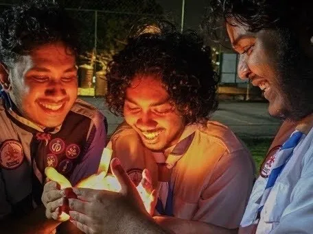 Scouts smiling during an activity