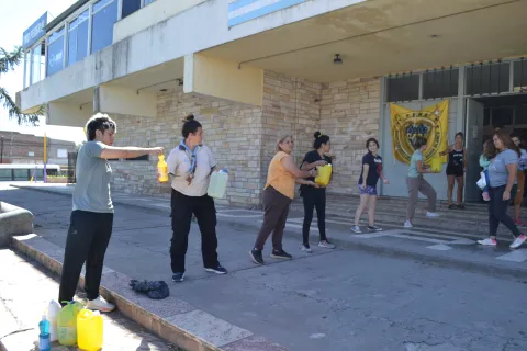 scouts in line helping a shelter
