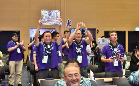 Scouts holding banners at the 28th Asia-Pacific Scout Conference