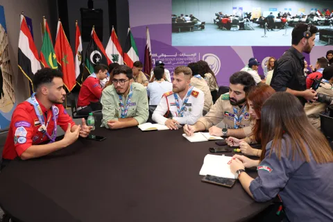 Participants talking in the Arab Youth Forum