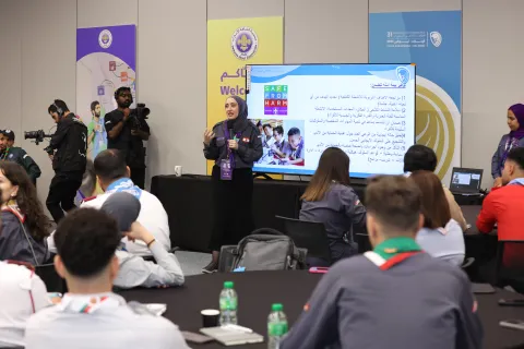 Participants talking in the Arab Youth Forum