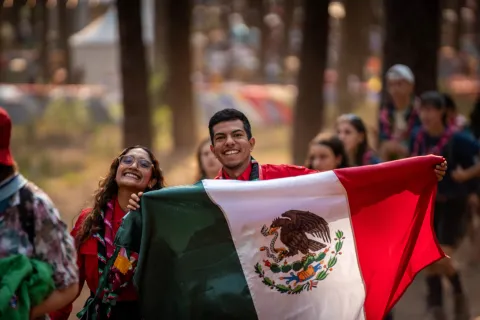 Scouts from Mexico waving their flag