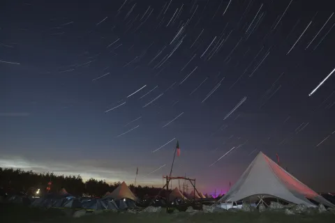 A view of stars over a campsite